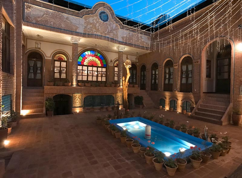 The central courtyard of Tehran's Razaz Boutique Hotel at night; Photo source: Google Map; Photographer: Tripadvisor