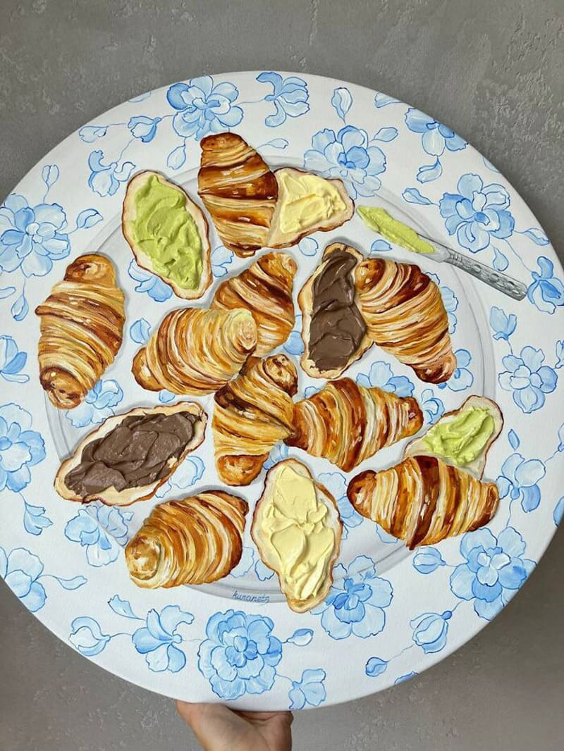 Painted mini croissants on a plate