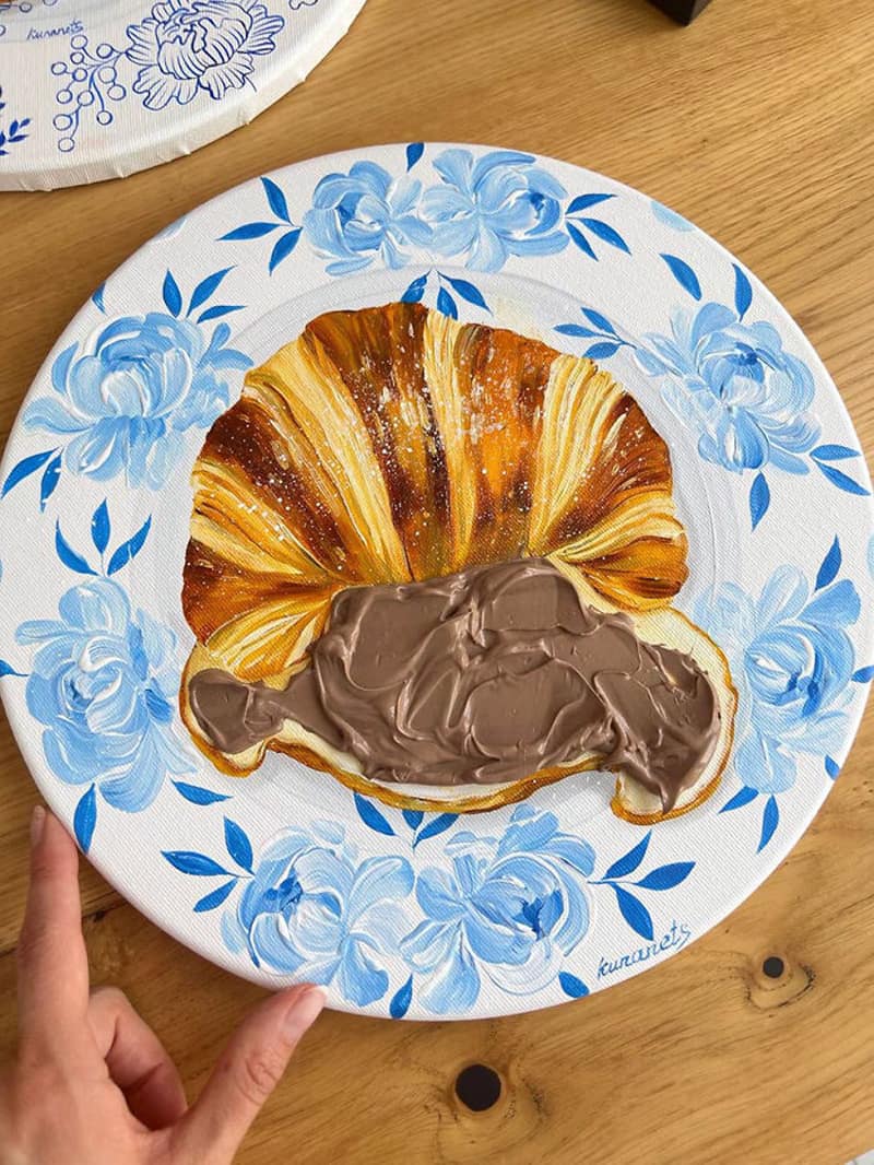 Painted chocolate croissants on a plate