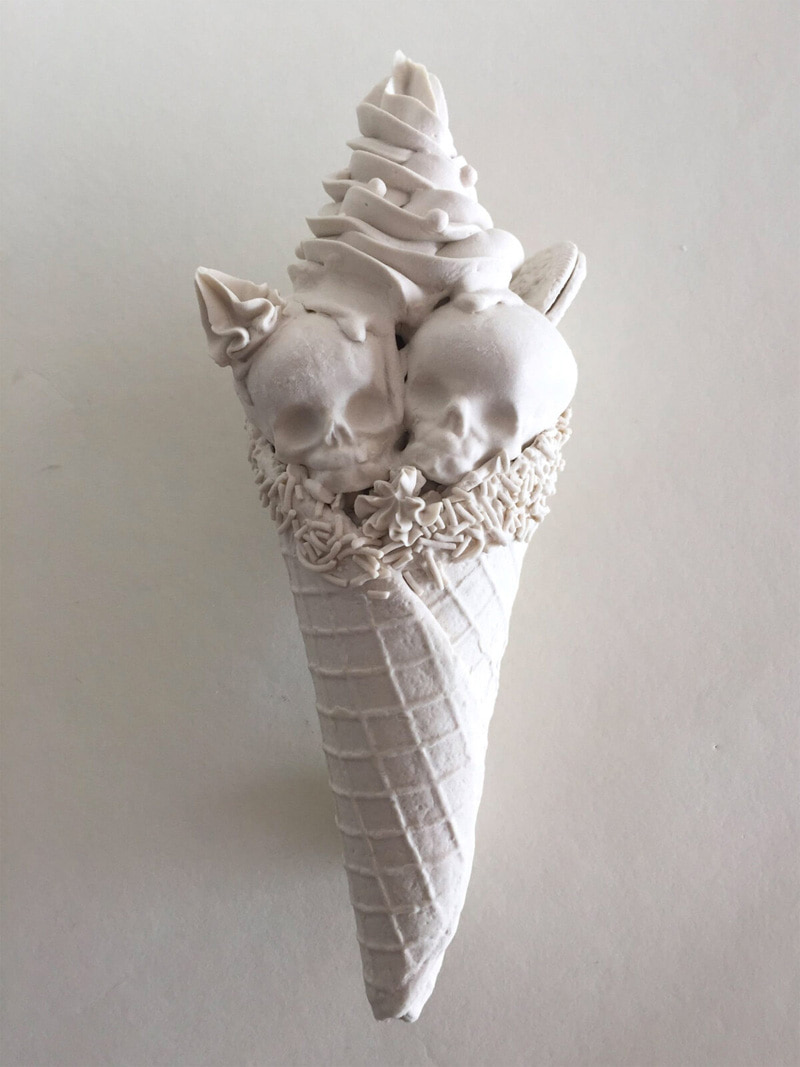 Chinese sculpture of a skull and ice cream