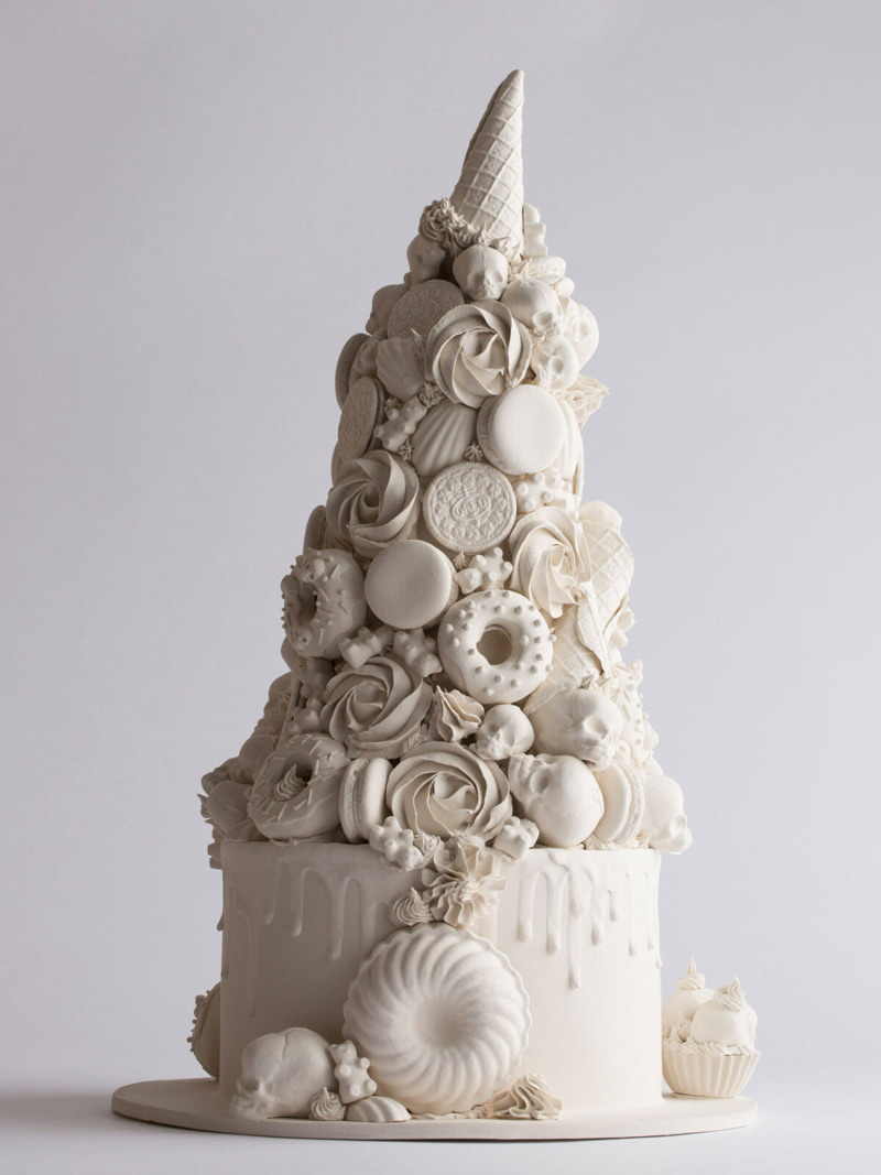 A large cream cake porcelain figurine