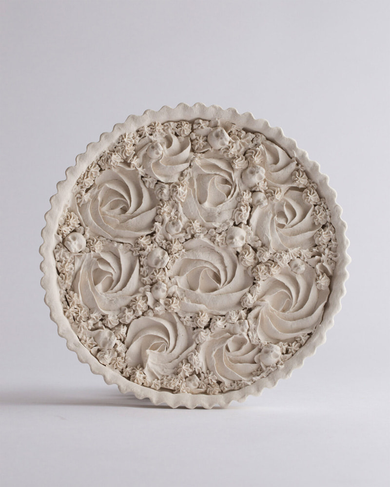 Porcelain tart rosette statue