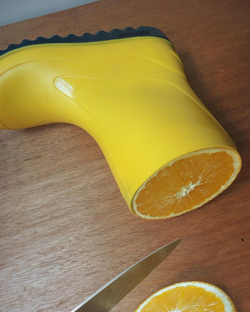 Combined photo of yellow boots and orange slices