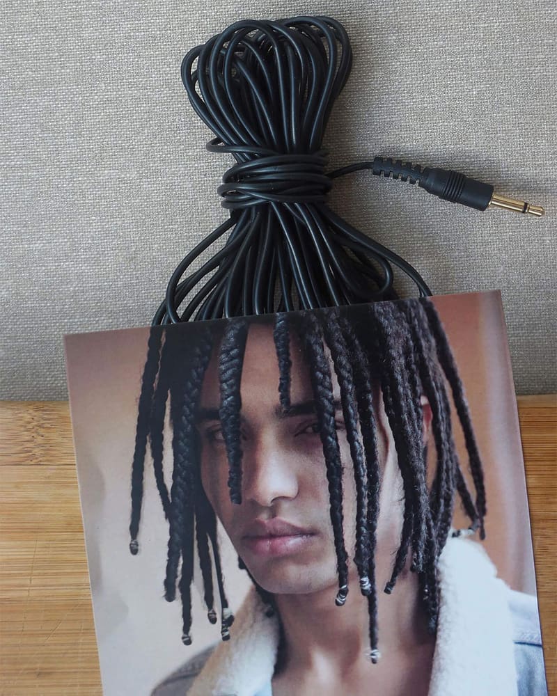 Combined photo of charging cable and braided hair