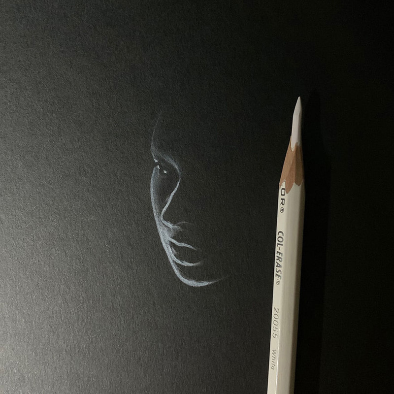 Face drawing with white pencil
