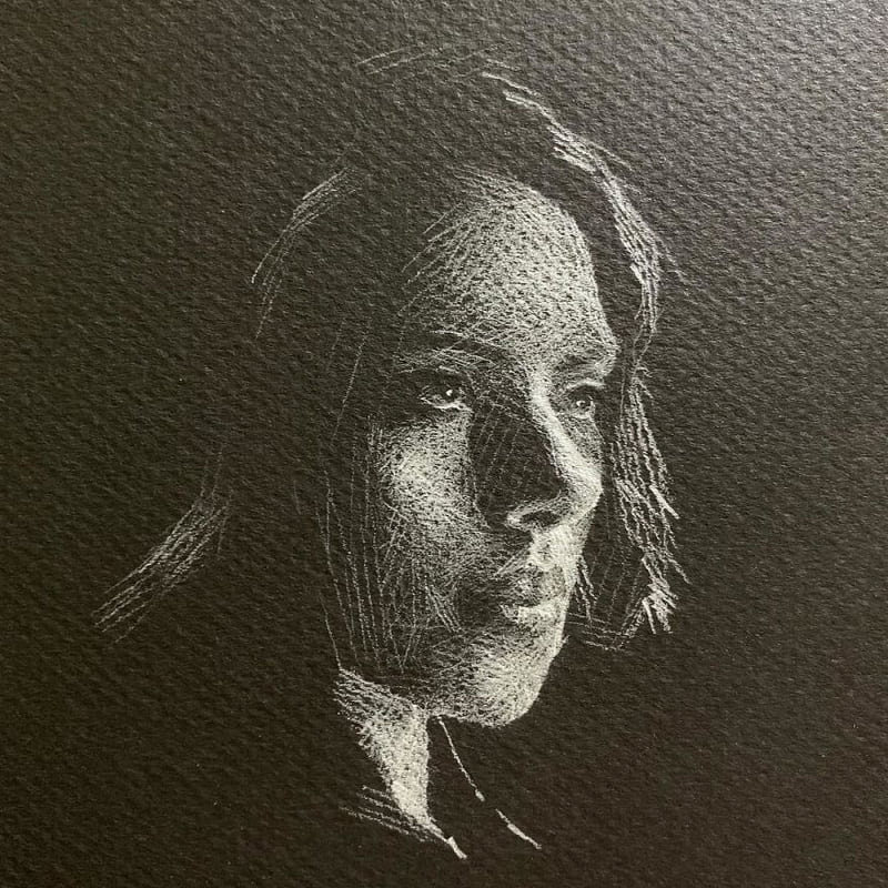 Portrait drawing of Scarlett Johansson with white pencil