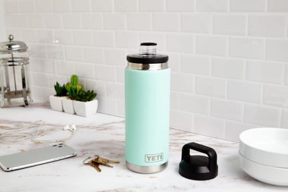 Blue travel flask with open lid, photo source: Travel Leisure, photographer: unknown