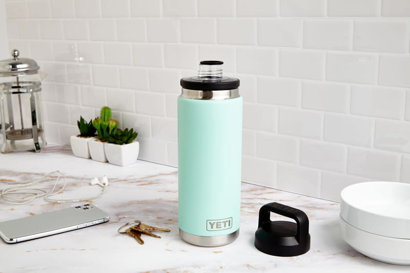 Blue travel flask with open lid, photo source: Travel Leisure, photographer: unknown