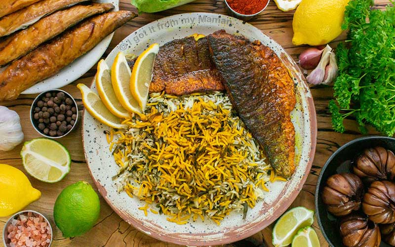 Vegetable pilaf with fish and oranges