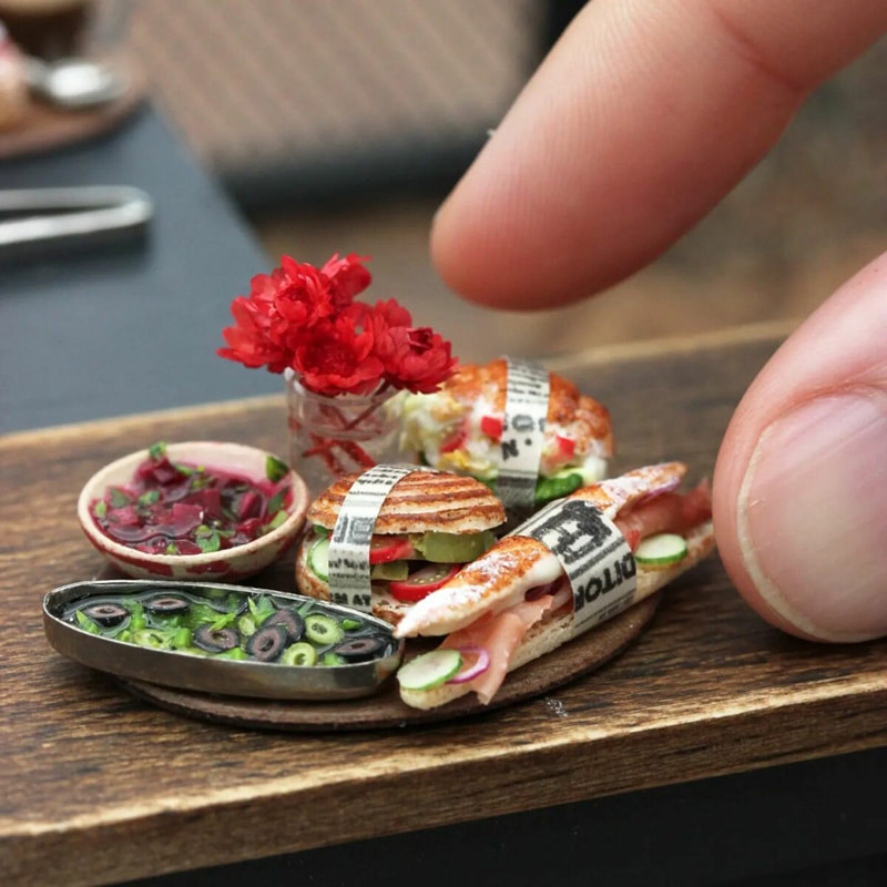 Various miniature sandwiches made by Shai Aaron