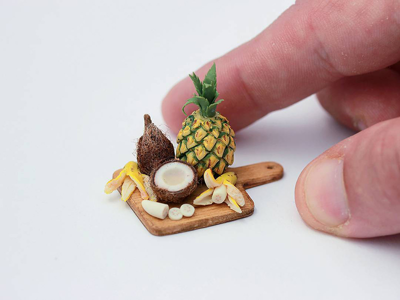 Cedar board with coconut and miniature pineapple