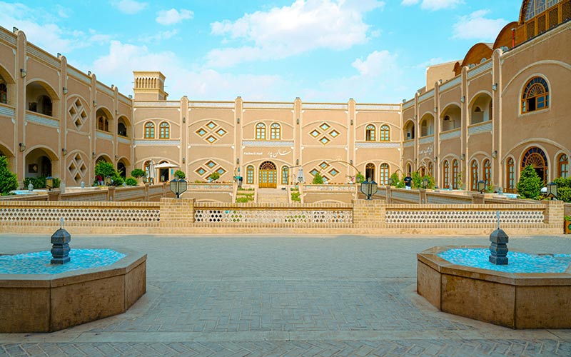 Yard of Dad Hotel, Yazd, photo source: unsplash.com, photographer: Dad Hotel