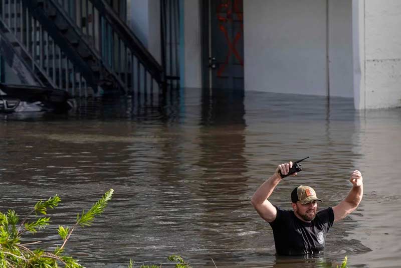 Police in Hurricane Milton; Photo source: npr.org website; Photographer: Mike Stewart
