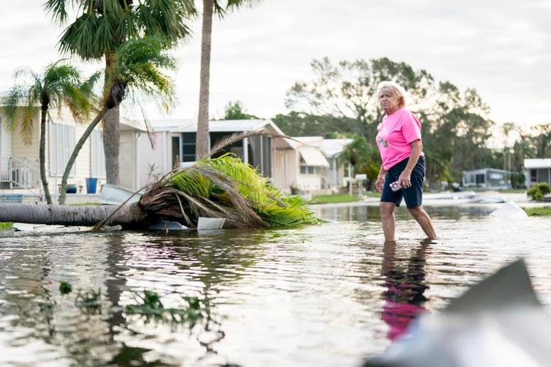 Old woman in Hurricane Milton, Florida; Photo source: npr.org website; Photographer: Sean Rayford