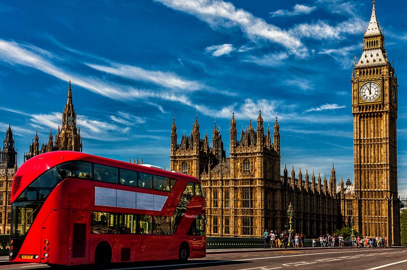   Big Ben clock and red bus in London; Photo Source: AMA Travel, Photographer: Unknown