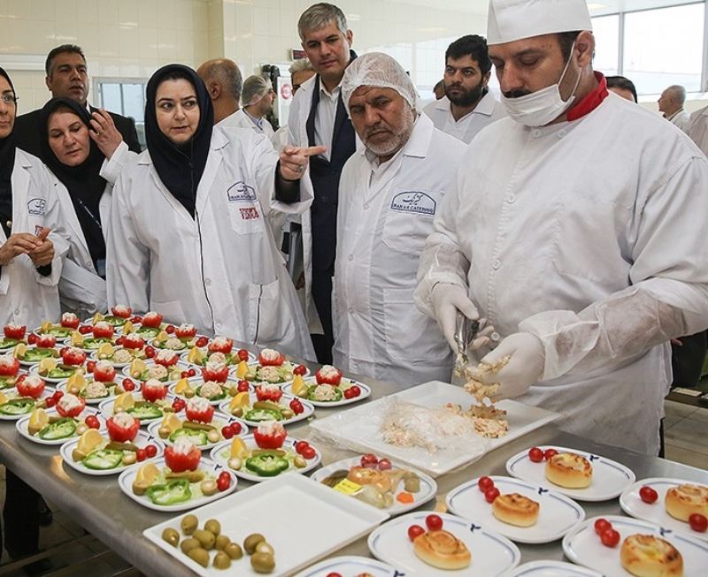 Food preparation in Iran Air kitchen. Photo source: Wikimedia site. Photographer: Mohsen Atai