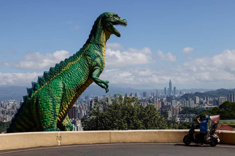 A giant dinosaur statue in Taipei, <a href=