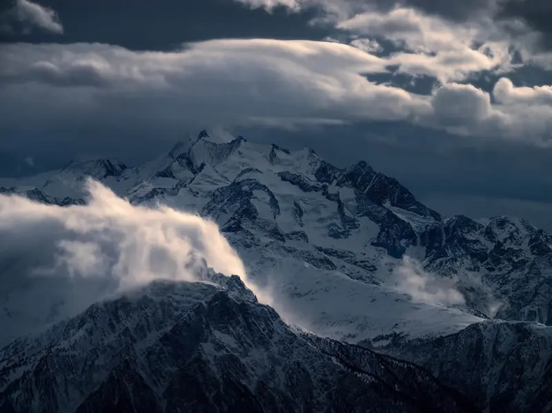 Clouds over the top of the Alps