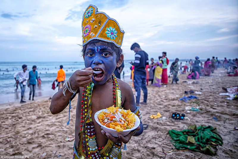 Indian boy eating food