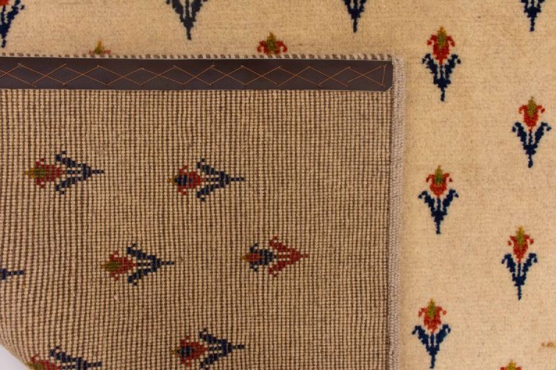 The back and the top are hand-woven with floral designs. Source: Iran Gebe website; Photographer: Unknown