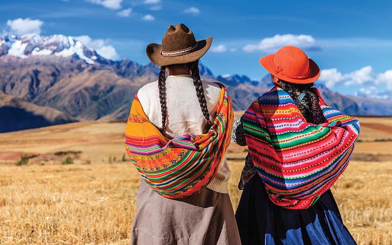 Women in native clothes in the mountains