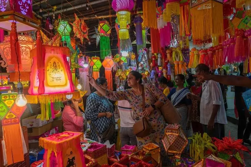 buying Diwali decorations; Photo source: Edition.cnn.com website. Photographer: Rafiq Maqbool