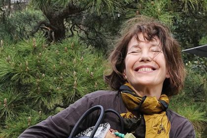 Birkin jeans with an accessorized Hermes Birkin bag, 2013