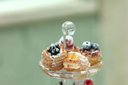 A two-tier container of miniature sweets made by Shai Aaron