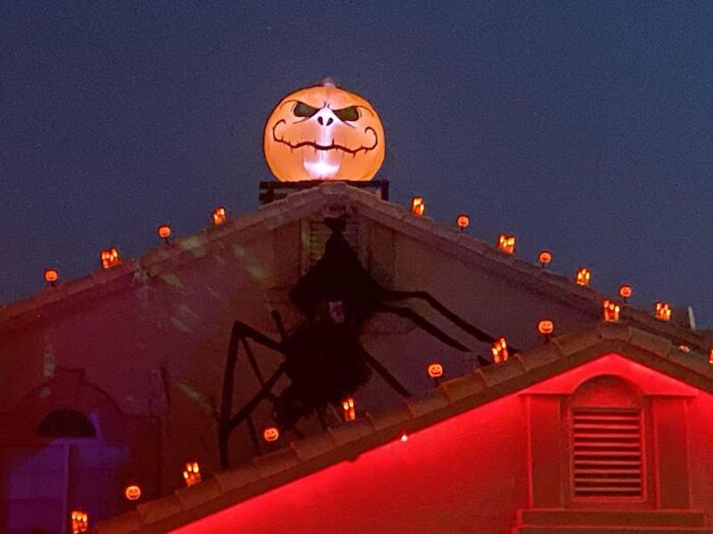 Halloween decorations on the roof of the house