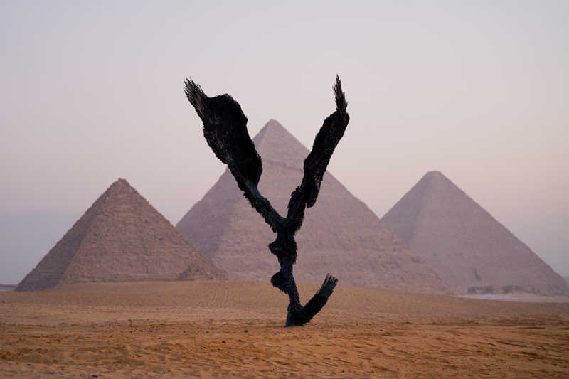Jake Michael Singer artwork next to the Egyptian pyramids