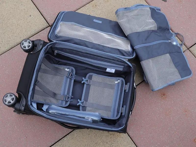 A suitcase with multiple internal compartments and a formal dress cover; Photo source Businessinsider.com. Unknown photographer