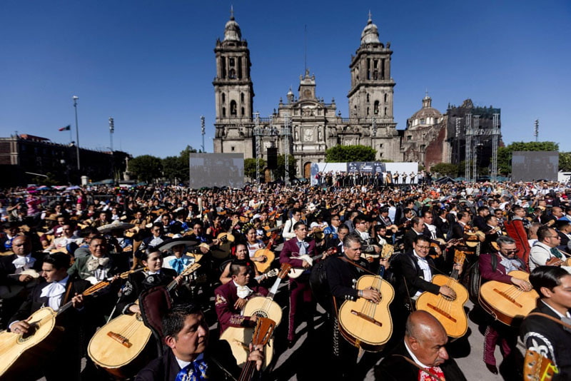 hundreds of mariachi musicians performing traditional Mexican songs in Plaza de la Constitución; Photographer: Quetzalli Nixcte-Ha 