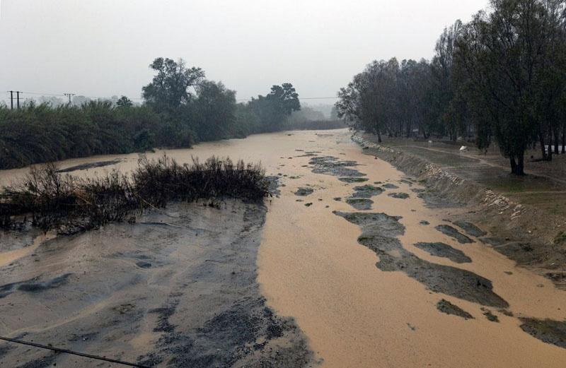 Red alert for risk of river flooding in Malacca, Indonesia; Photographer: Carlos Diaz 
