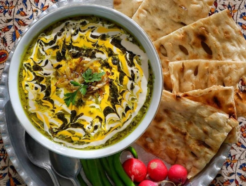 Isfahan beet leaf soup garnished with curd; Photo source: salamdonya.com. Photographer: Unknown