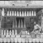 Historical photo of a shop in Rasht, photo by Antoine Sorogin