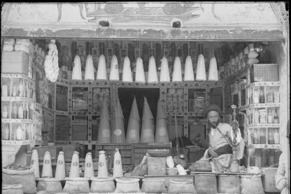 Historical photo of a shop in Rasht, photo by Antoine Sorogin