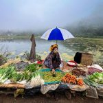A seller waiting for customers in the Myanmar street market; Photographer: Sai Aung