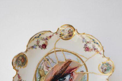 White porcelain plate with embroidery and eye design