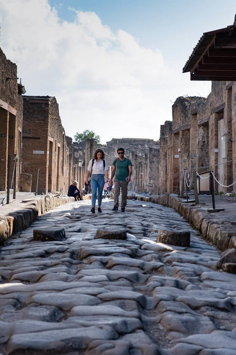 Tourists in the ancient city of Pompeii