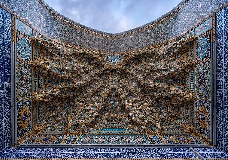 The beehive of the dome arch of Imam Reza Firozeh Sahn shrine