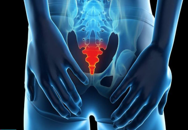 What is the cause of coccyx pain in women when sitting?