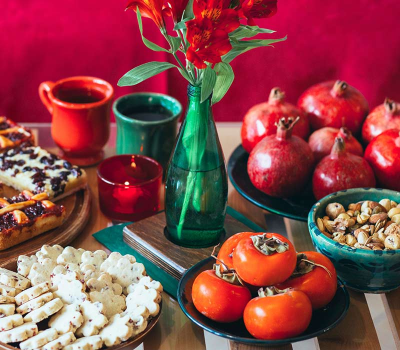 Fruit and nuts on the Yalda table, photo source: unsplash.com, photographer: Fatane Rahimi