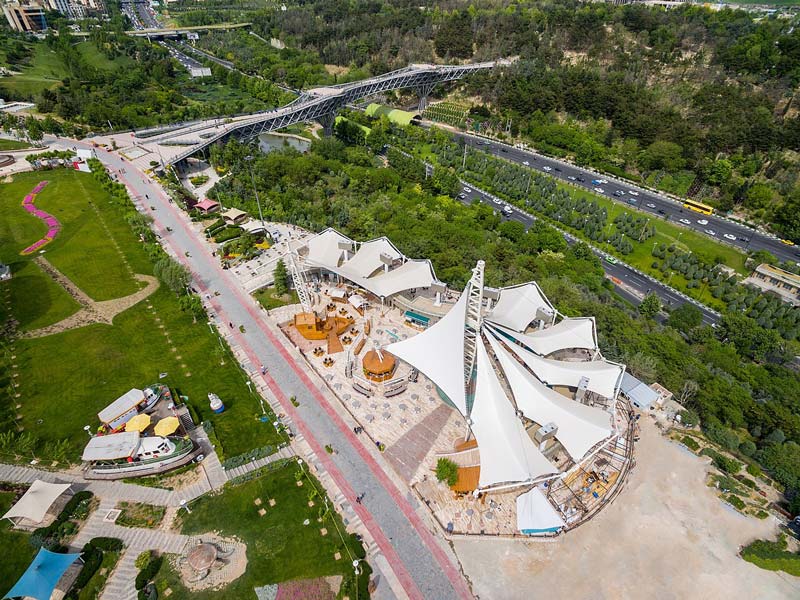 water and fire park tents; Photo source: Wikimedia; Photographer: Diba Tensile Architecture
