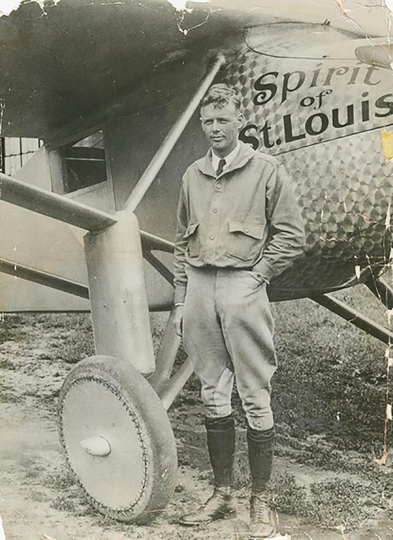 Charles Lindbergh, the famous American pilot next to his famous plane in 1927; Photographer: Unknown