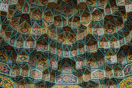 Moqrans work with turquoise flower tiles; Photo source: Wikimedia; Photographer: Ramin Rahmani Nejad Asil