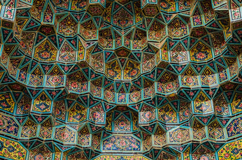 Moqrans work with turquoise flower tiles; Photo source: Wikimedia; Photographer: Ramin Rahmani Nejad Asil