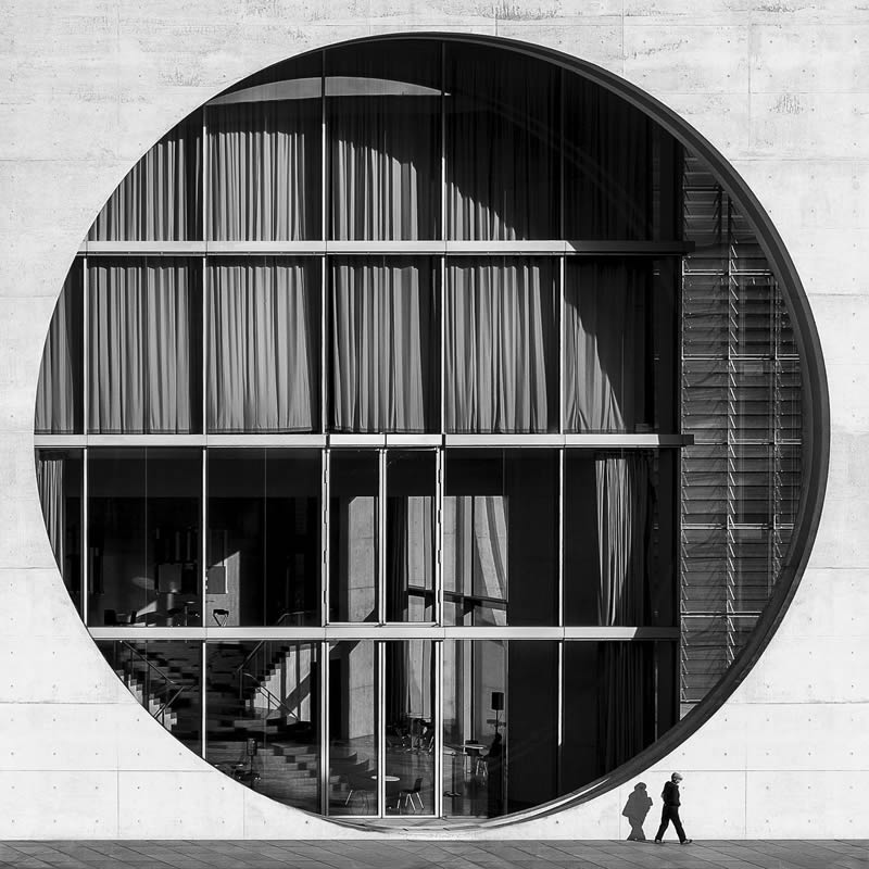 A circular window in the streets of Hamburg
