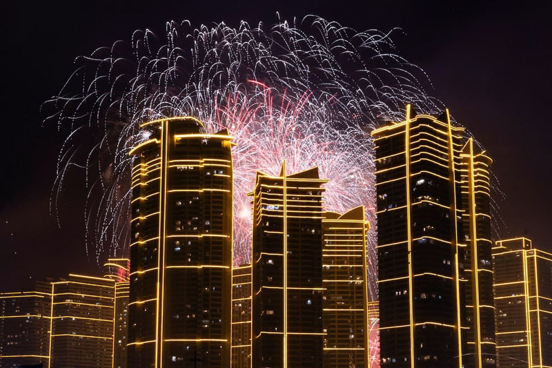 Fireworks over Rockwell Center during the New Year celebration in Mandaluyong City, Metro Manila, Philippines; Photo source: REUTERS; Photographer's name: Eloisa Lopez
