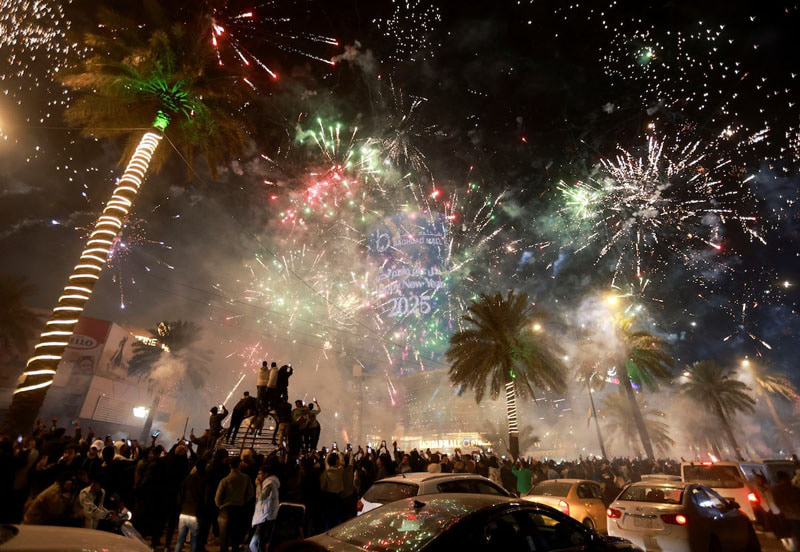 Fireworks during the New Year celebration in Baghdad, Iraq; Photo source: REUTERS; Name of the photographer: Ahmed Saad