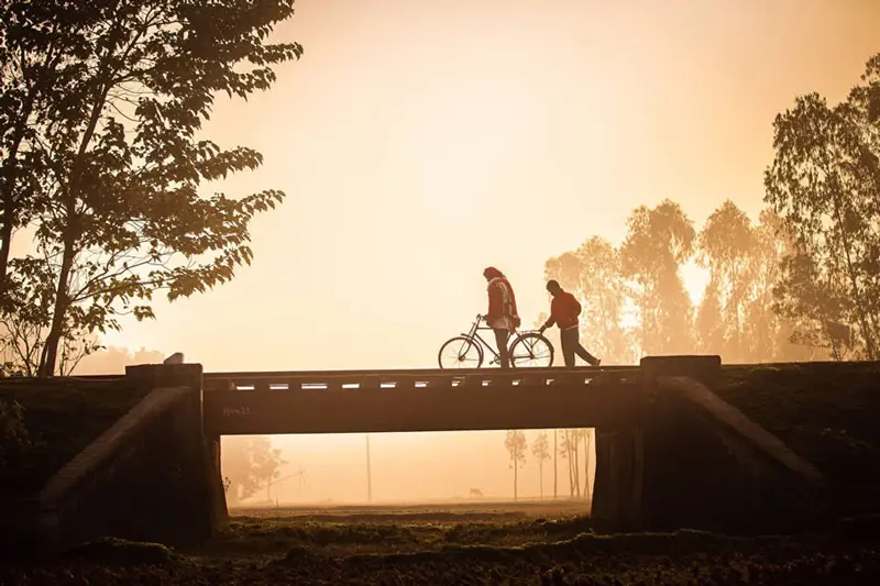 Fog at sunset in a village in Bangladesh; Photo source: 121clicks.com; Photographer: Mou Aysha